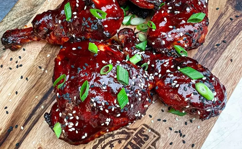 Chicken Gochujang dish - a spicy Korean chicken dish on a chopping board | Herd Fed Poultry