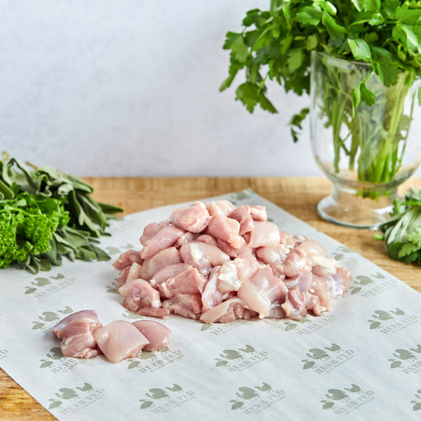 Diced Herb Fed chicken leg meat image 0